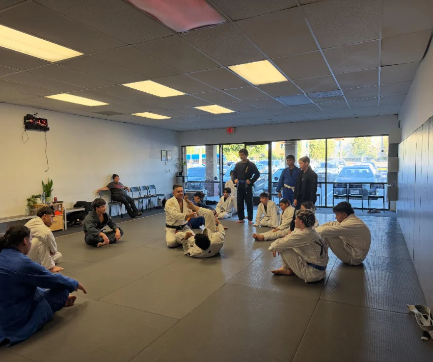Adult Brazilian jiu-jitsu students training on the mats at Kulture BJJ in Riverside, California